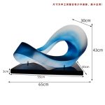 Modern minimalist hotel entrance foyer soft decoration with a high-end feel, niche transparent ornaments, resin sculptures, and artworks