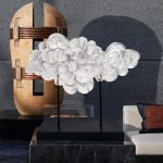 Modern minimalist hotel entrance foyer soft decoration with a high-end feel, niche transparent ornaments, resin sculptures, and artworks