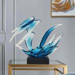 Modern minimalist hotel entrance foyer soft decoration with a high-end feel, niche transparent ornaments, resin sculptures, and artworks